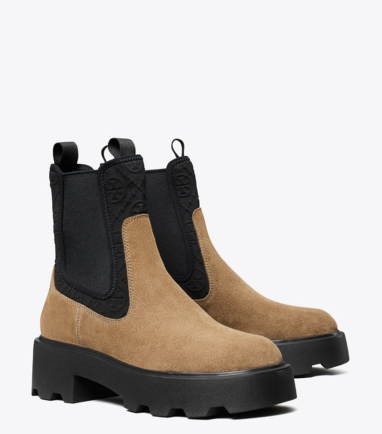 Tory Burch designer ankle boots T Monogram Chelsea Lug Boot in RIVER ROCK angle