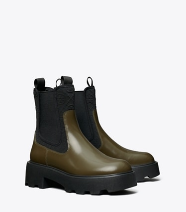 Tory Burch designer ankle boots T Monogram Chelsea Lug Boot in DARK OLIVE angle