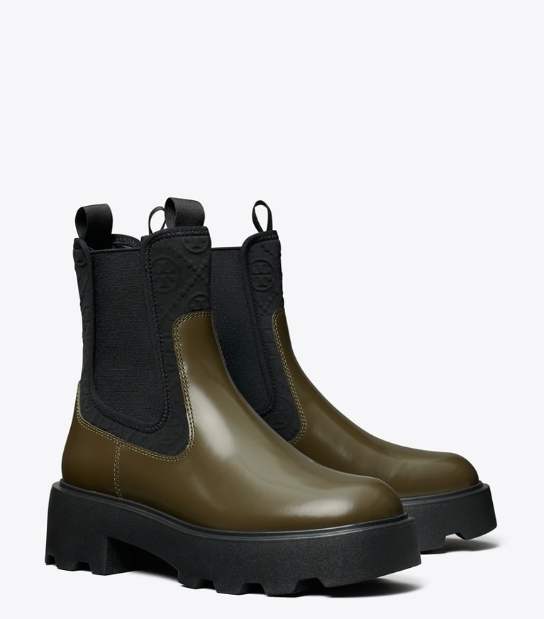 Tory Burch designer ankle boots T Monogram Chelsea Lug Boot in DARK OLIVE angle