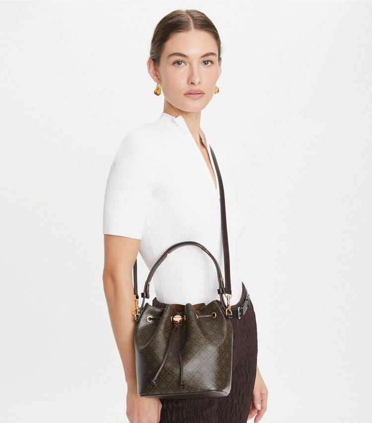 Tory Burch designer crossbody bags T Monogram Coated Canvas Bucket Bag in French Press accessory on model