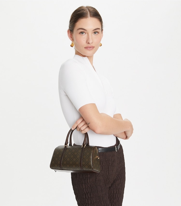 Tory Burch designer crossbody bags T Monogram Coated Canvas Petite Barrel Bag in French Press accessory on model