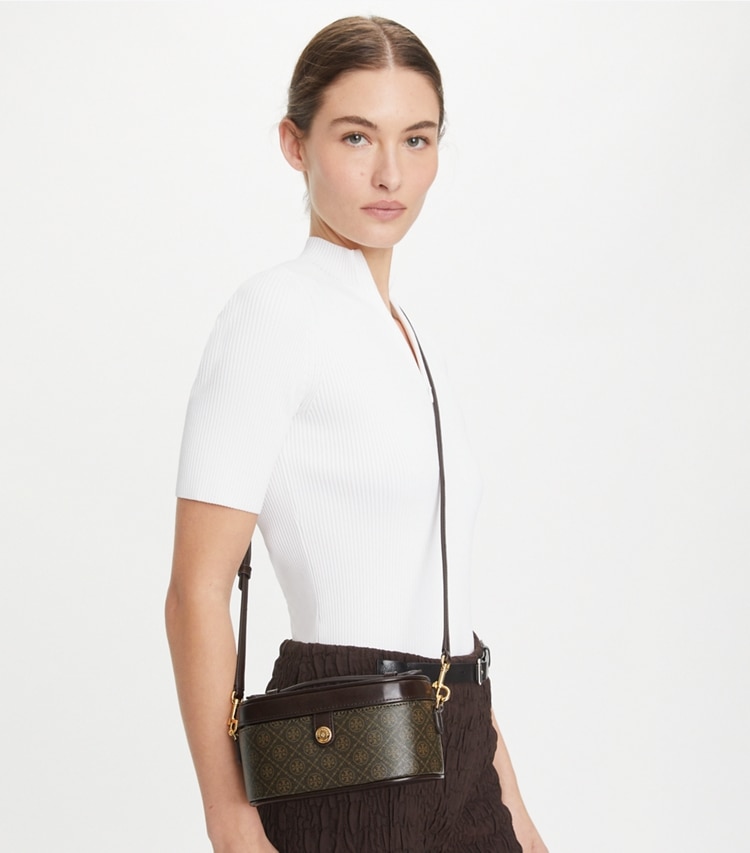 Tory Burch designer mini bags T Monogram Coated Canvas Vanity Case in French Press accessory on model