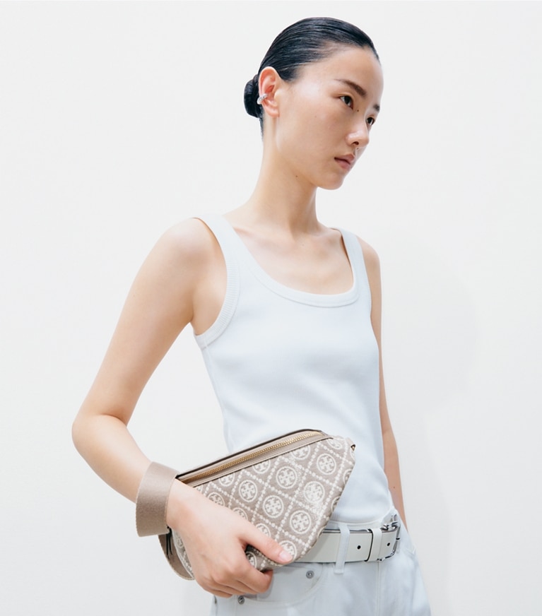 Tory Burch designer belt bags T Monogram Coated Jacquard Belt Bag in Charcoal accessory on model