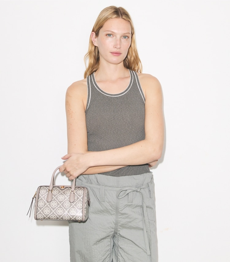 Tory Burch designer crossbody bags T Monogram Coated Jacquard Petite Barrel Bag in Charcoal additional on model