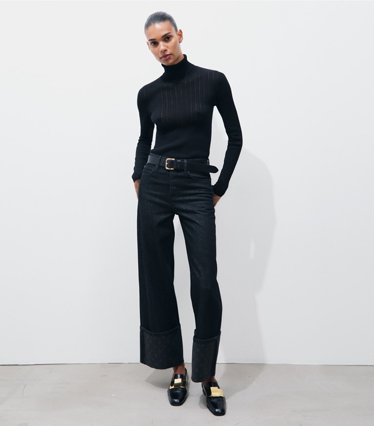Tory Burch designer bottoms T Monogram Contrast Cuff Straight Leg Jean in Rinse Wash on model front