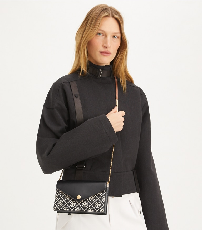Tory Burch designer mini bags T Monogram Contrast Embossed Envelope Crossbody in Black / NEW CREAM angle
