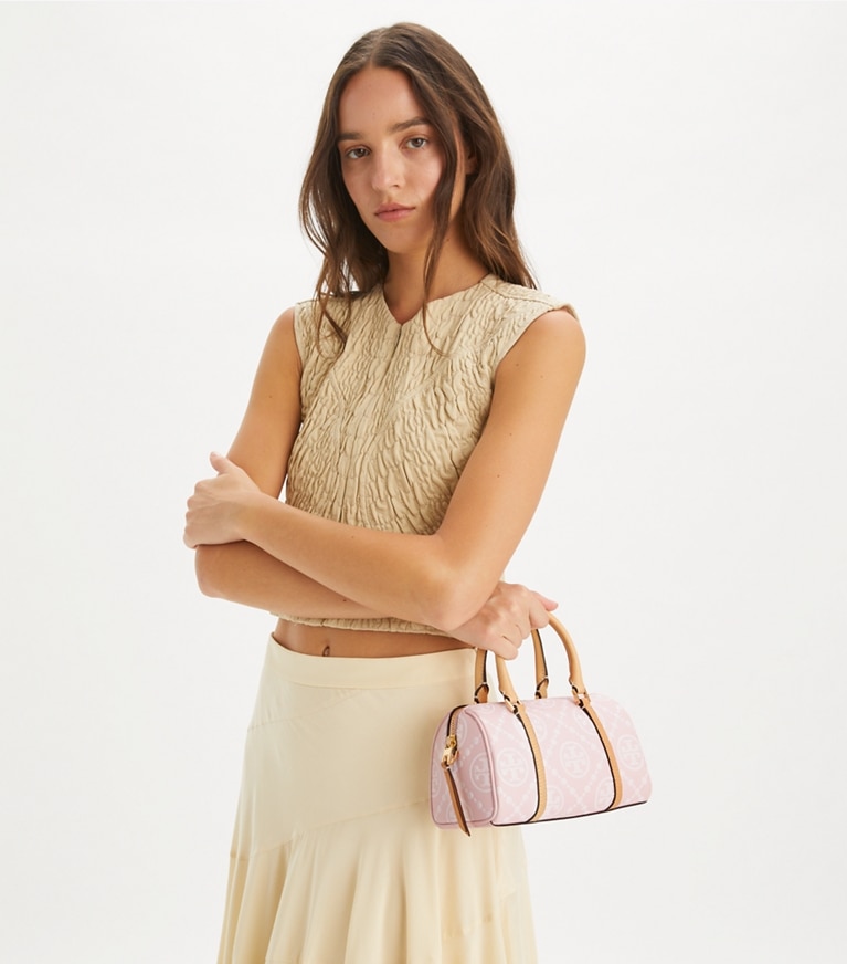 Tory Burch designer クロスボディバッグ Tモノグラム コントラスト エンボス プチバレルバッグ in Powder Pink angle
