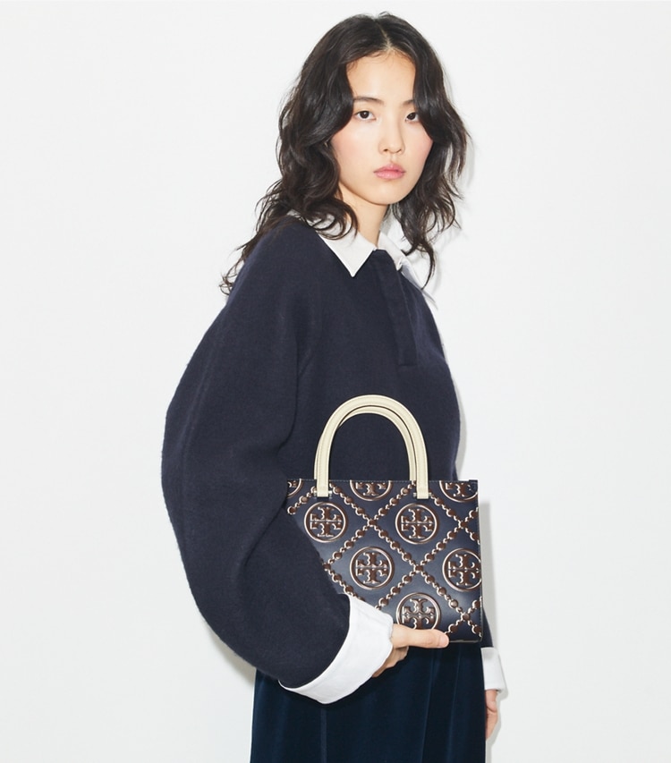 Tory Burch designer tote bags T Monogram Contrast Embossed Top-Handle Tote in Tory Navy / John Coco additional on model