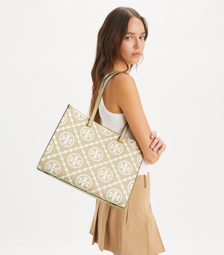 Tory Burch designer tote bags T Monogram Contrast Embossed Tote in Beige accessory on model