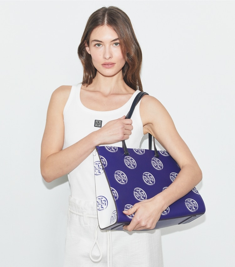Tory Burch designer tote bags T Monogram Contrast Embossed Tote in Ballpoint Blue accessory on model