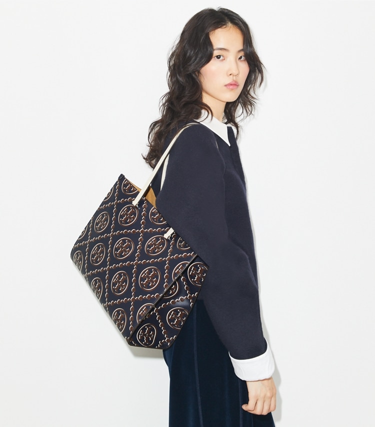 Tory Burch designer tote bags T Monogram Contrast Embossed Tote in Tory Navy / John Coco accessory on model