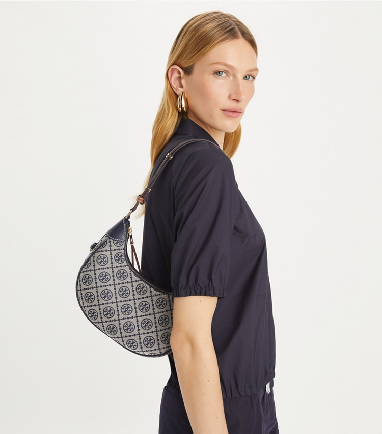 Tory Burch designer shoulder bags T Monogram Crescent Bag in Tory Navy additional on model