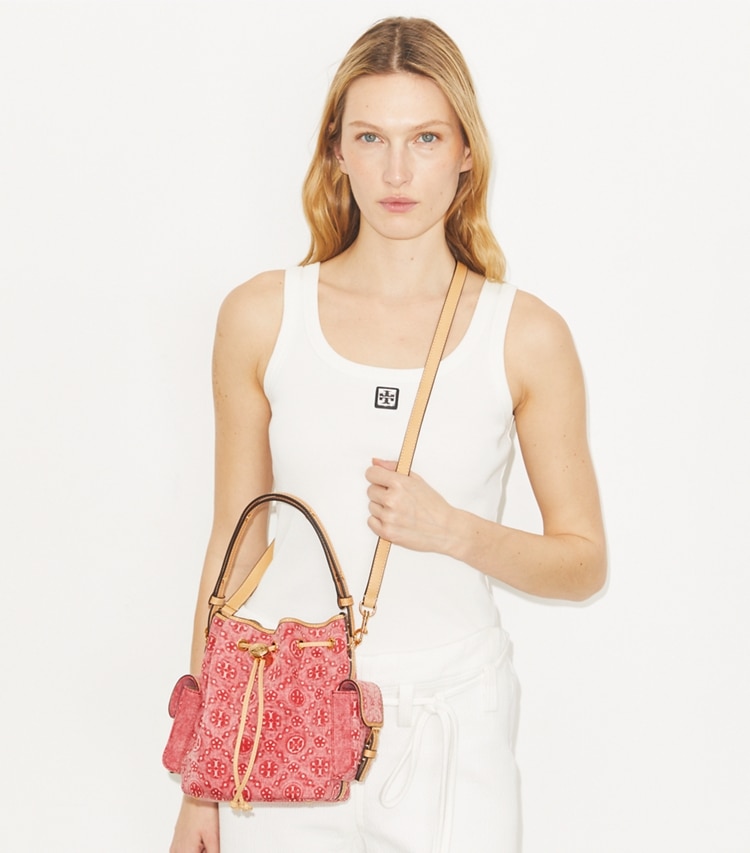 Tory Burch designer crossbody bags T Monogram Denim Bucket Bag in Brilliant Red accessory on model