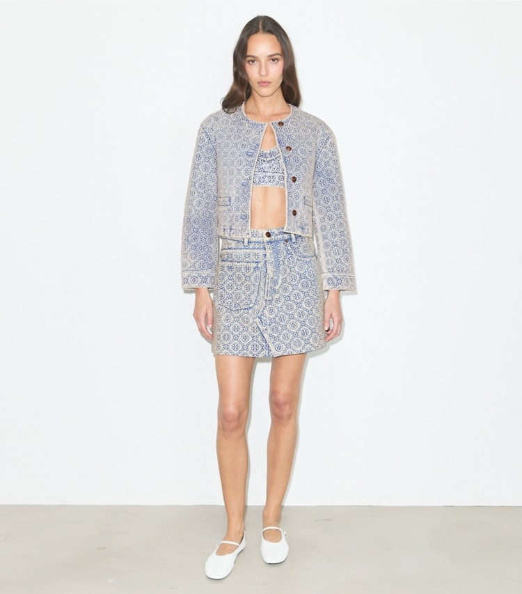 Tory Burch designer jackets T Monogram Denim Jacket in Bleached Wash T Monogram on model front