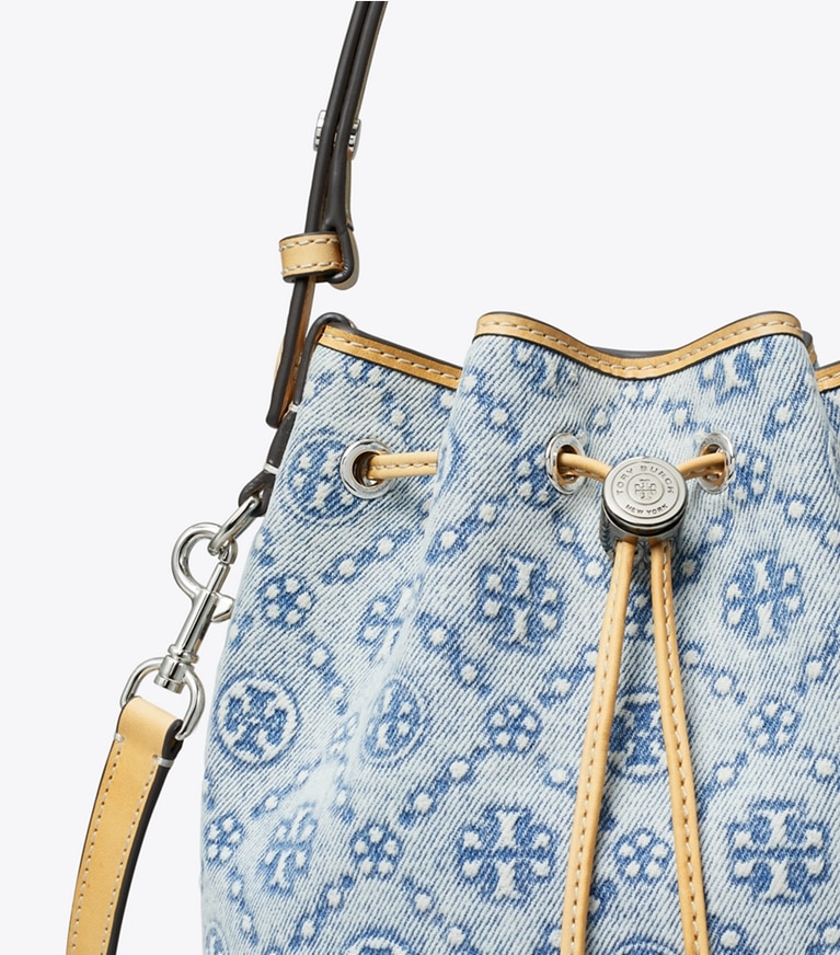 Tory Burch designer crossbody bags T Monogram Denim Mini Bucket Bag in Powder Blue angle
