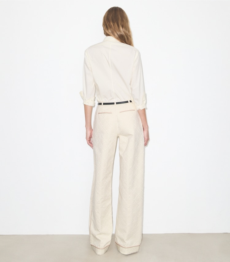 Tory Burch designer bottoms T Monogram Denim Pant in White / Ivory T Monogram on model back