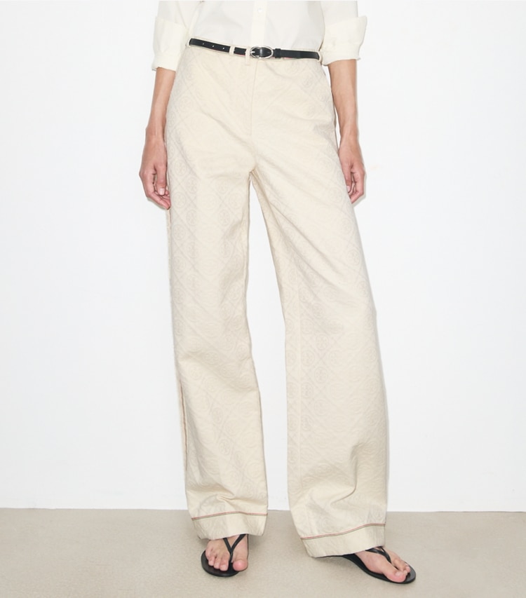 Tory Burch designer bottoms T Monogram Denim Pant in White / Ivory T Monogram on model detail