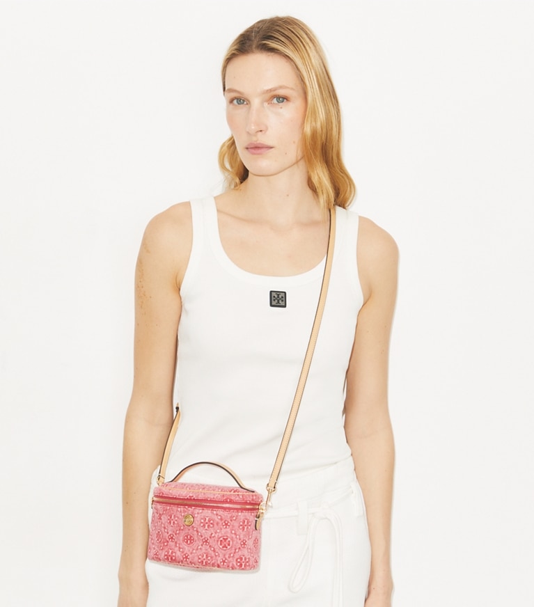 Tory Burch designer mini bags T Monogram Denim Soft Vanity Case in Red accessory on model