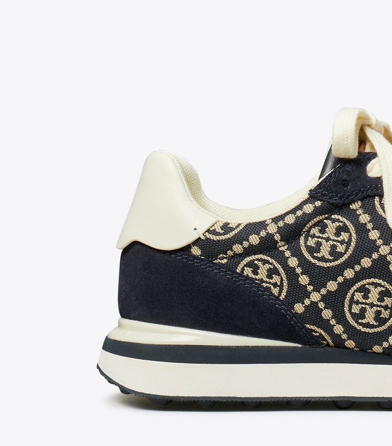 Tory Burch designer sneakers T Monogram Destiny Trainer in NAVY / PERFECT NAVY / WHITE angle