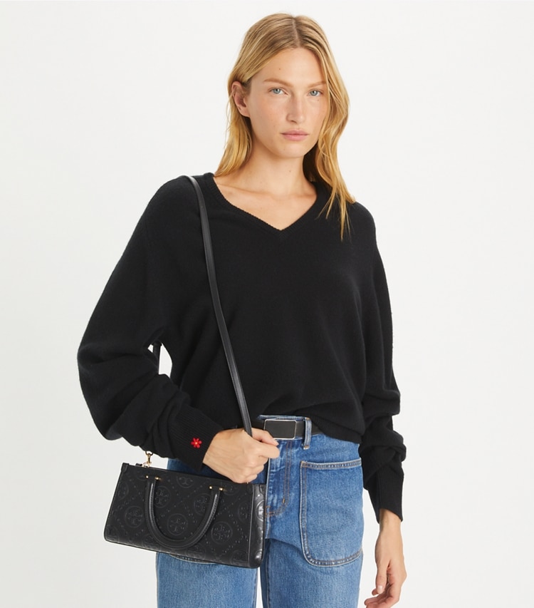Tory Burch designer satchels T Monogram Embossed Small East-West Tote in Black accessory on model