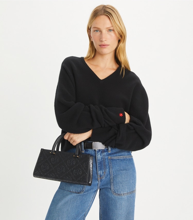 Tory Burch designer satchels T Monogram Embossed Small East-West Tote in Black additional on model