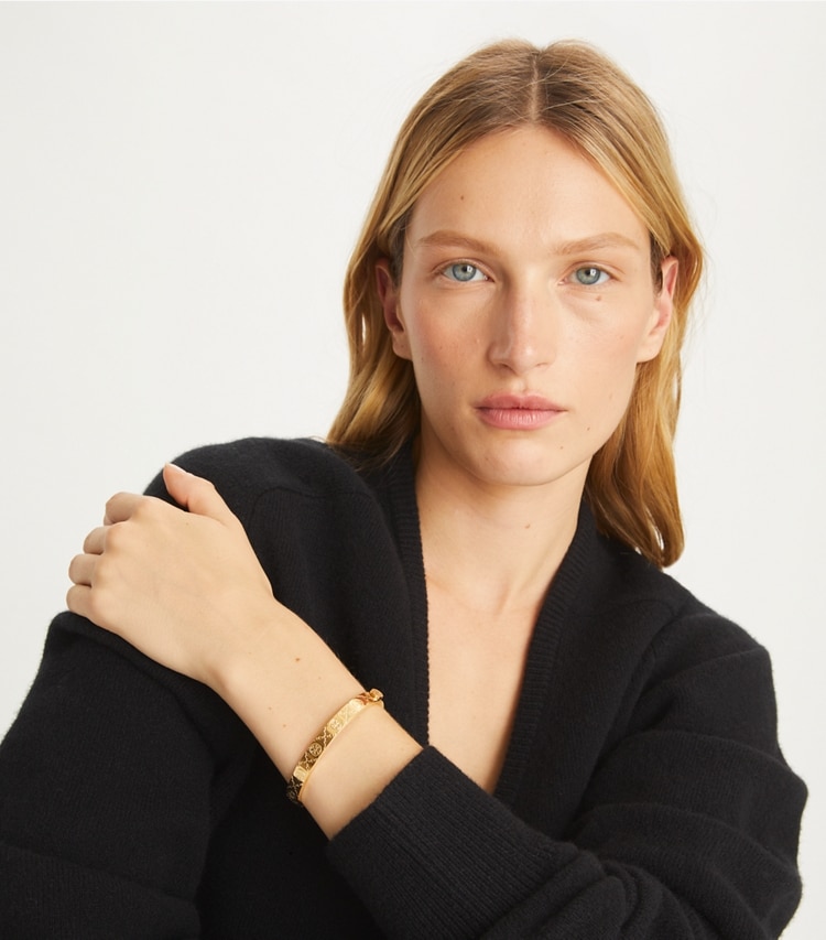 Tory Burch designer bracelets T Monogram Hinge Bracelet in Tory Gold accessory on model