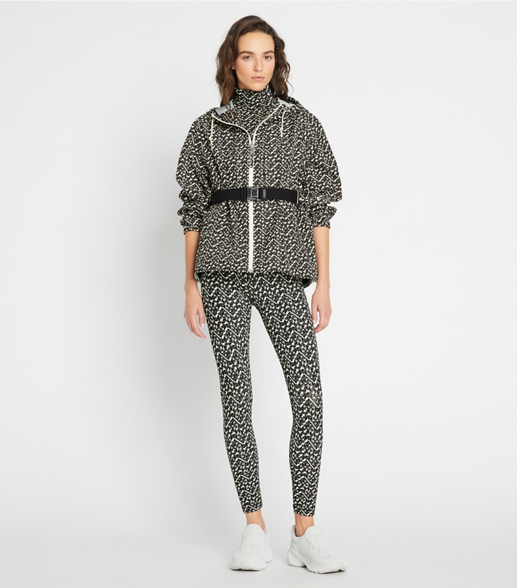 Tory Sport designer jackets T Monogram Hooded Anorak in Black Prismatic T Monogram Small on model front