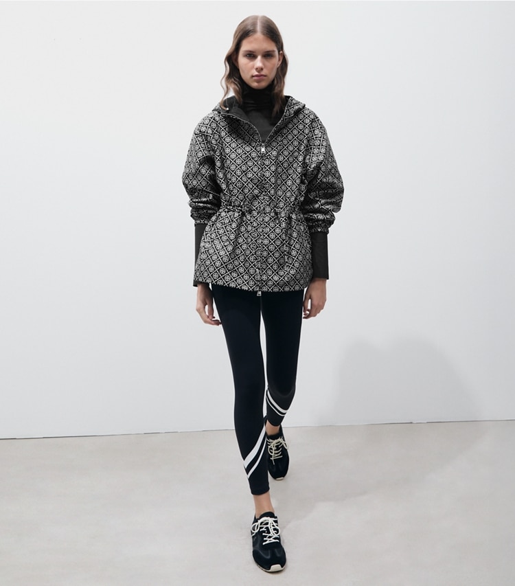 Tory Sport designer jackets T Monogram Jacquard Anorak in Black T MONOGRAM SMALL SPORT on model front