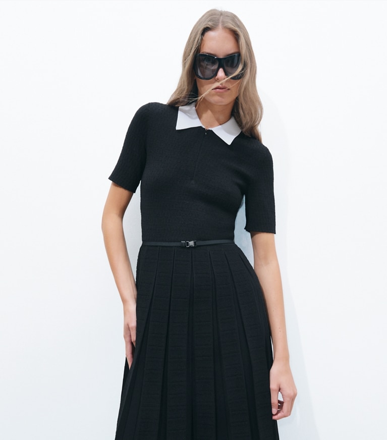 Tory Burch designer dresses T Monogram Jacquard Pleated Dress in BLACK / WHITE / BLACK on model detail