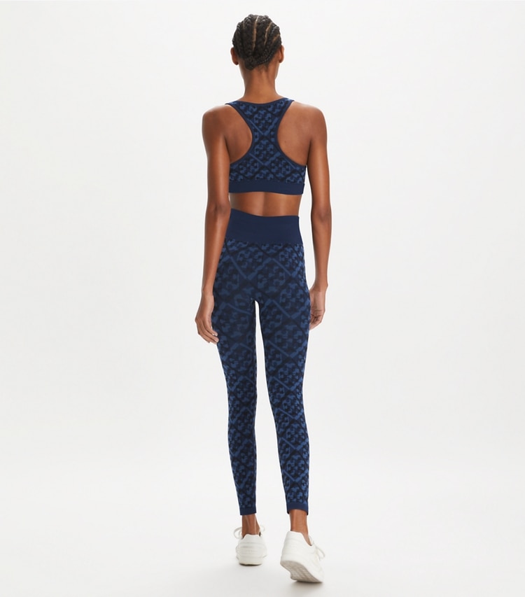 Tory Sport designer bottoms T Monogram Jacquard Seamless Legging in Dark Blue Prismatic T Monogram on model back