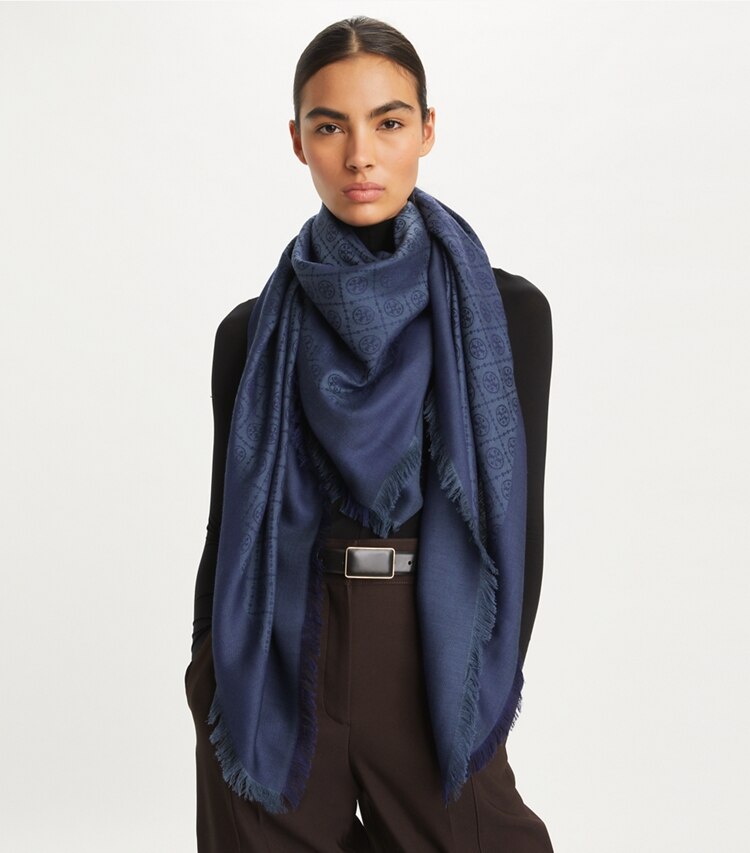 Tory Burch designer scarves T Monogram Jacquard Traveler Scarf in Tory Navy accessory on model