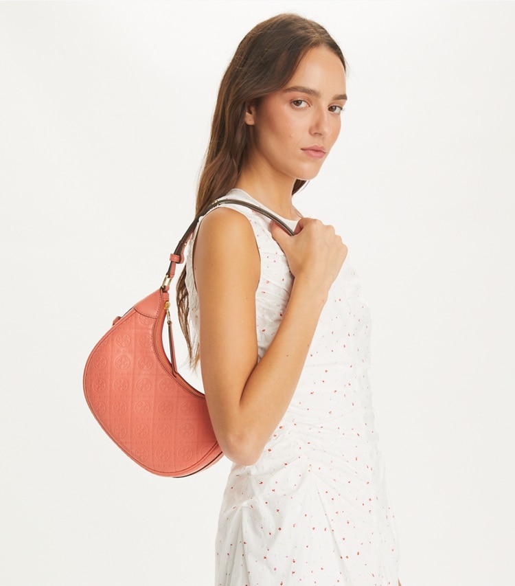 Tory Burch designer shoulder bags T Monogram Leather Crescent Bag in Coral Crush accessory on model