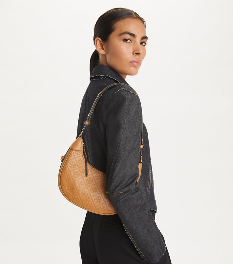 Tory Burch designer shoulder bags T Monogram Leather Crescent Bag in Tan additional on model