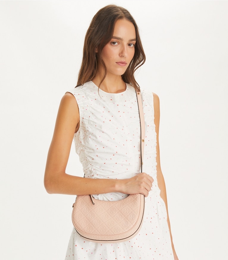Tory Burch designer shoulder bags T Monogram Leather Crescent Bag in Blush additional on model