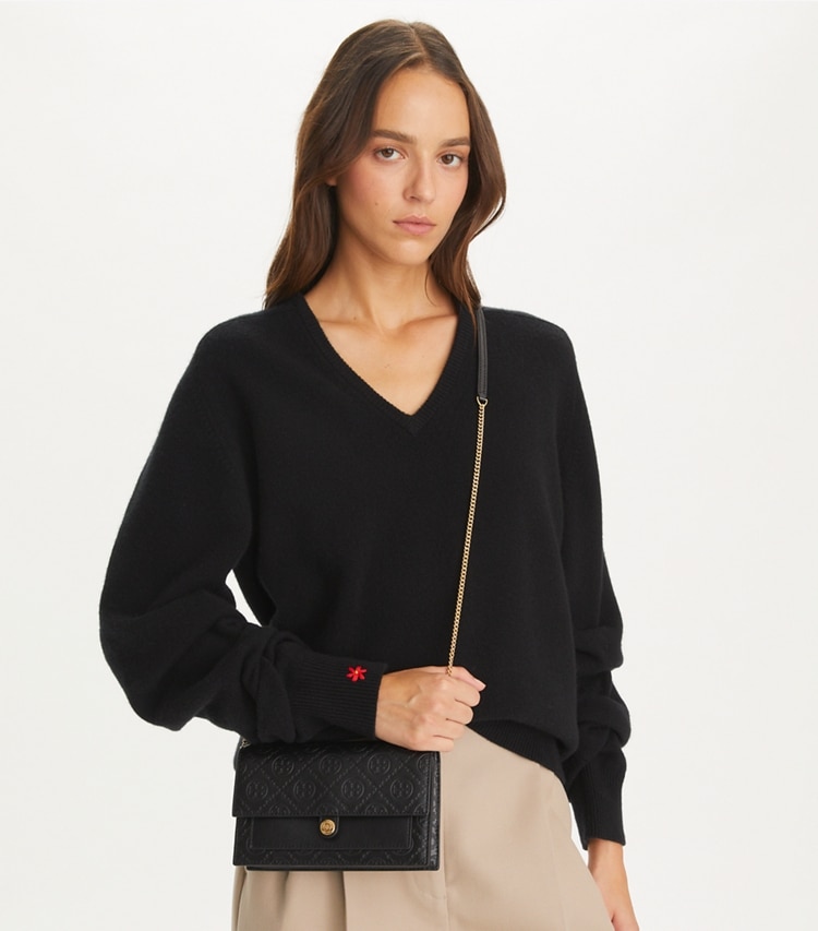Tory Burch designer mini bags T Monogram Leather Crossbody in Black accessory on model