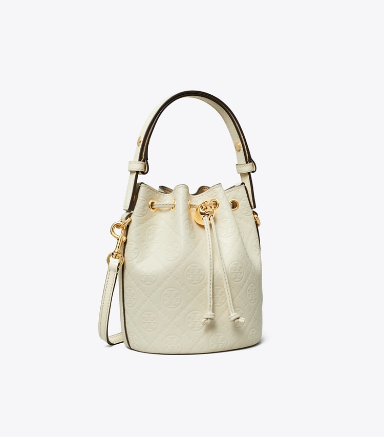 Tory Burch designer クロスボディバッグ Tモノグラム レザー ミニ バケットバッグ in Light Cream angle
