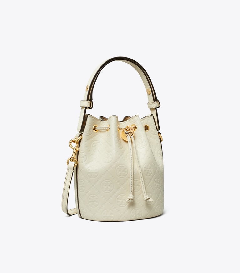 Tory Burch designer クロスボディバッグ Tモノグラム レザー ミニ バケットバッグ in Light Cream angle