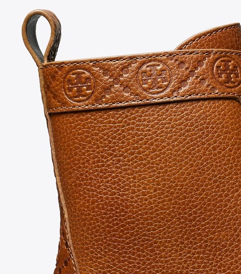 Tory Burch designer ankle boots T Monogram Lug Ankle Boot in TOASTED CARAMEL angle