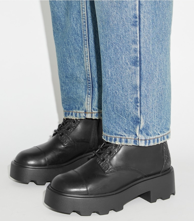 Tory Burch designer ankle boots T Monogram Lug Boot in PERFECT BLACK angle