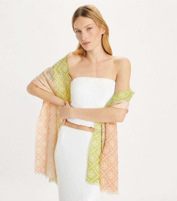 Tory Burch designer scarves T Monogram Multi-Stripe Oblong Scarf in Multi Stripe Traveler Oblong - Blue accessory on model