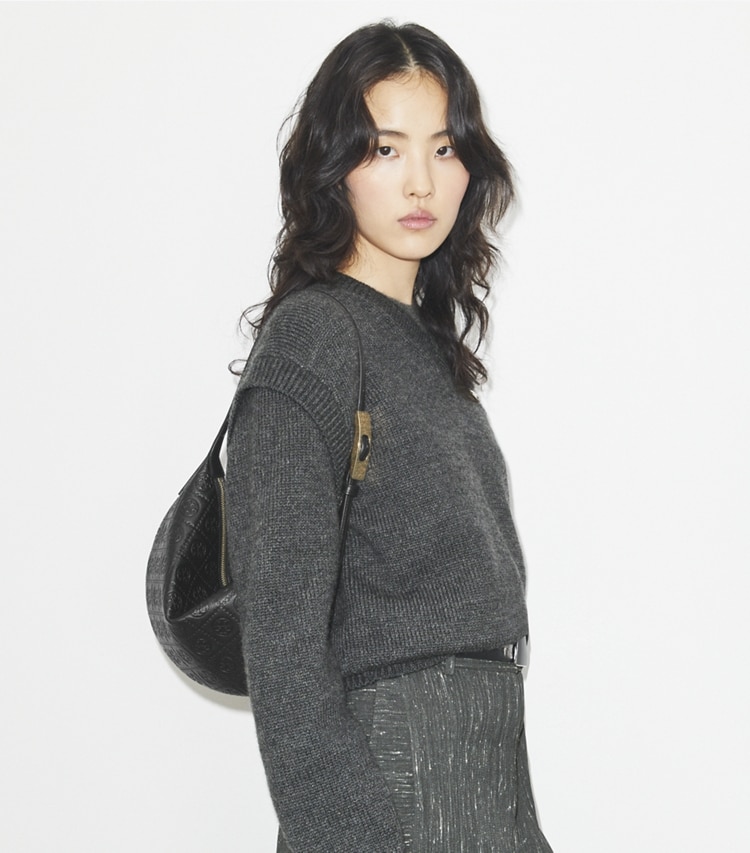 Tory Burch designer shoulder bags T Monogram Pebble Small Balloon Bag in Black accessory on model