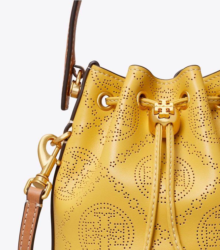 Tory Burch designer crossbody bags T Monogram Perforated Leather Mini Bucket Bag in Golden Sunset angle