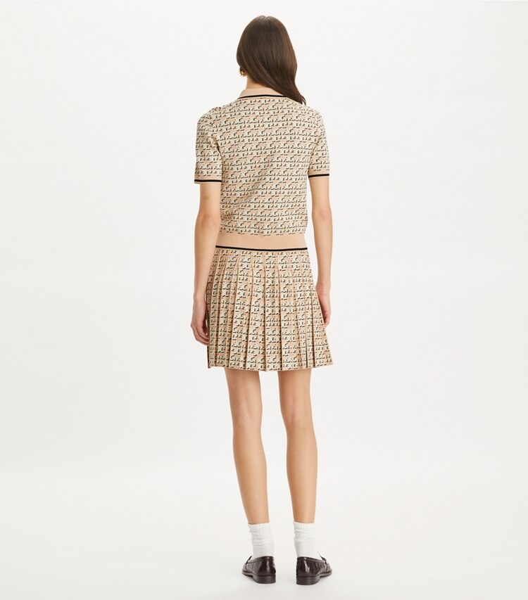 Tory Burch designer bottoms T Monogram Pleated Viscose Skirt in Apricot Blush T Logo Drop Shadow on model back