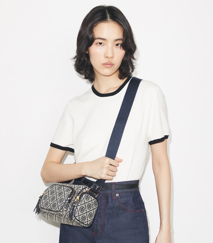 Tory Burch designer crossbody bags T Monogram Pocket Crossbody in Tory Navy accessory on model