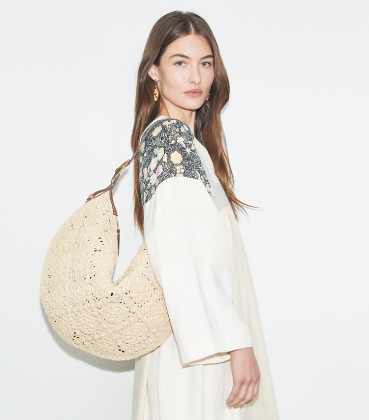 Tory Burch designer hobo bags T Monogram Raffia Balloon Bag in Natural accessory on model