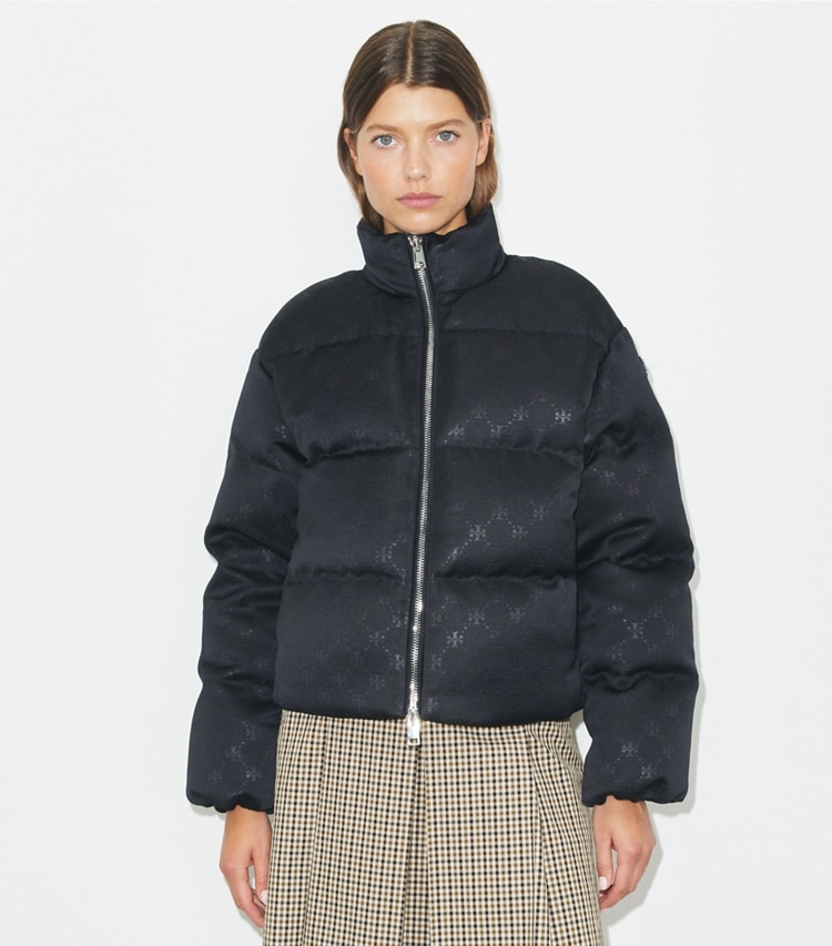 Tory Burch designer coats T Monogram Satin Puffer Jacket in Black on model detail