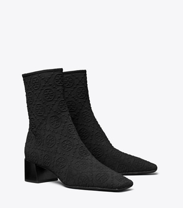 Tory Burch designer ankle boots T Monogram Stretch Ankle Boot in PERFECT BLACK angle