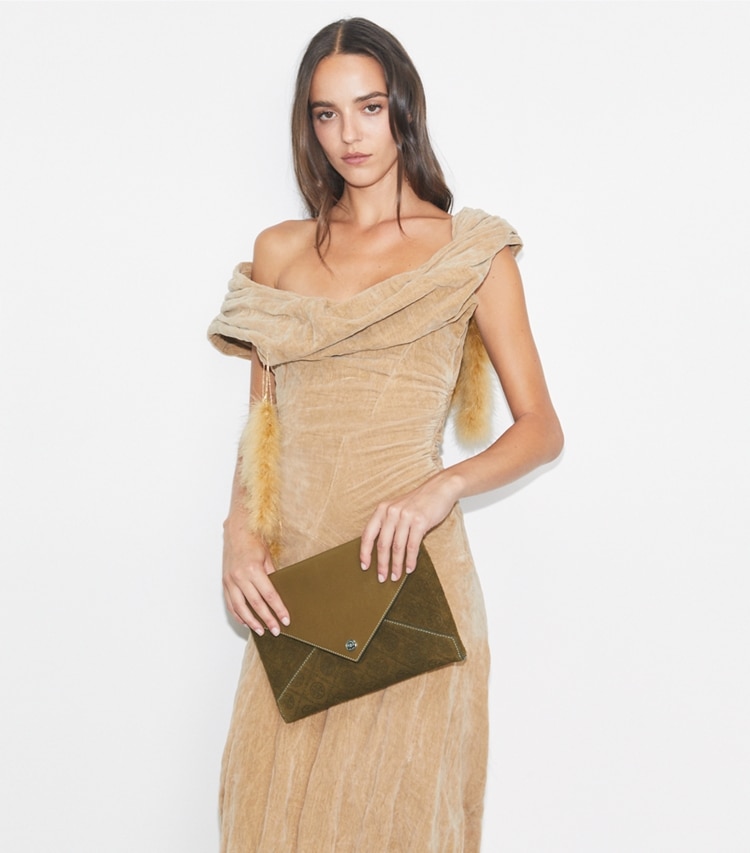 Tory Burch designer mini bags T Monogram Suede Envelope Chain Pouch in Deep Olive accessory on model