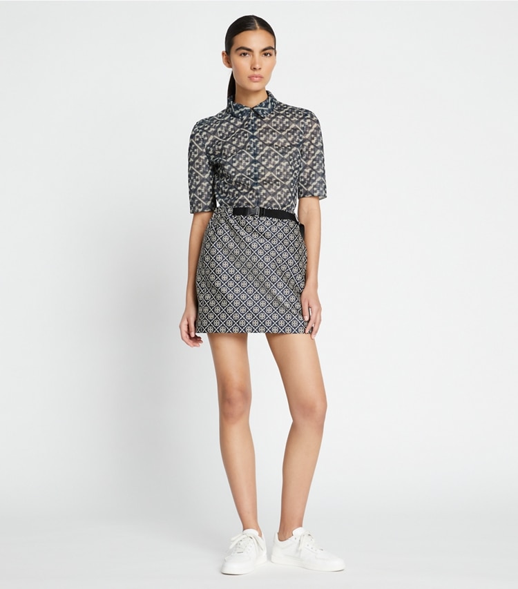Tory Sport designer bottoms T Monogram Tech Jacquard Skirt in TORY NAVY T MONOGRAM SMALL SPORT on model front