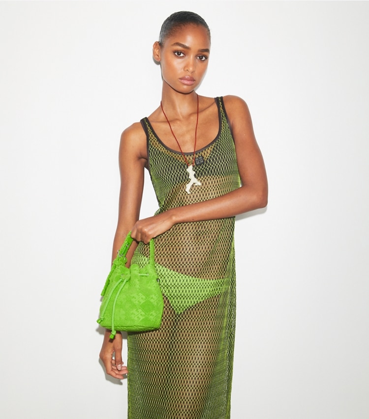 Tory Burch designer crossbody bags T Monogram Terry Mini Bucket Bag in Bright Fern additional on model
